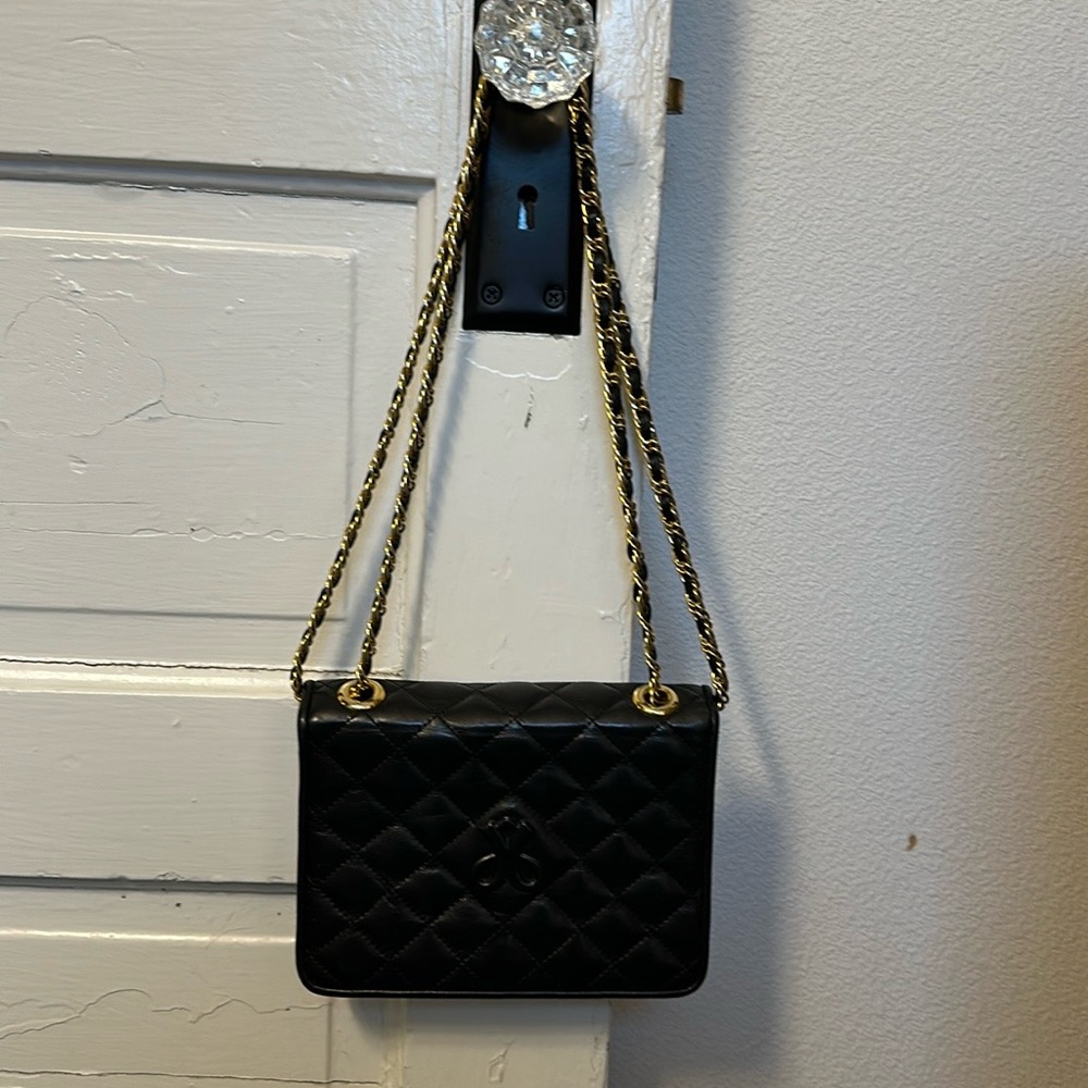 Designer leather cross body or clutch